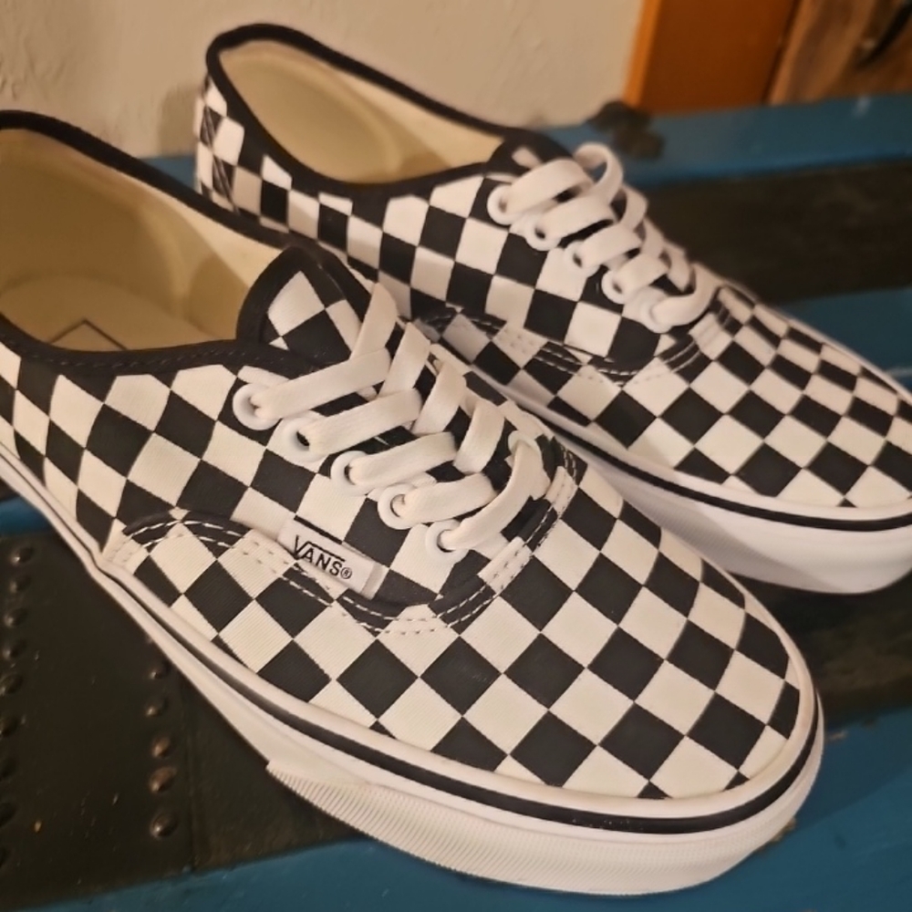 Vans black and white checkerboard sneakers with laces